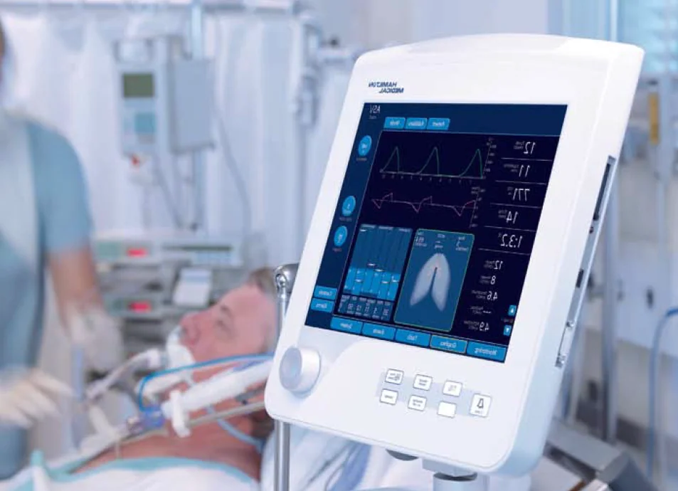 Hamilton Medical ICU ventilator with a touchscreen showing respiratory data and physical controls