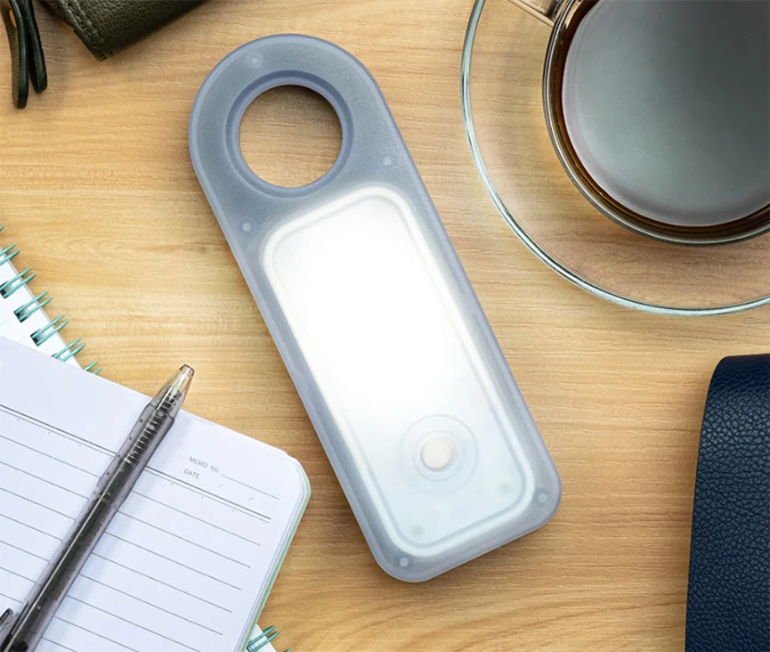 STARLIGHT ONE portable light with a long diffuser and circular carrying opening
